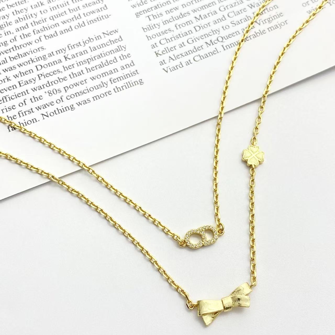 Bow & Butterfly Motif Pendant Necklace in Polished Metal-Tone with Layered Detail – Design 001 close-up detail
