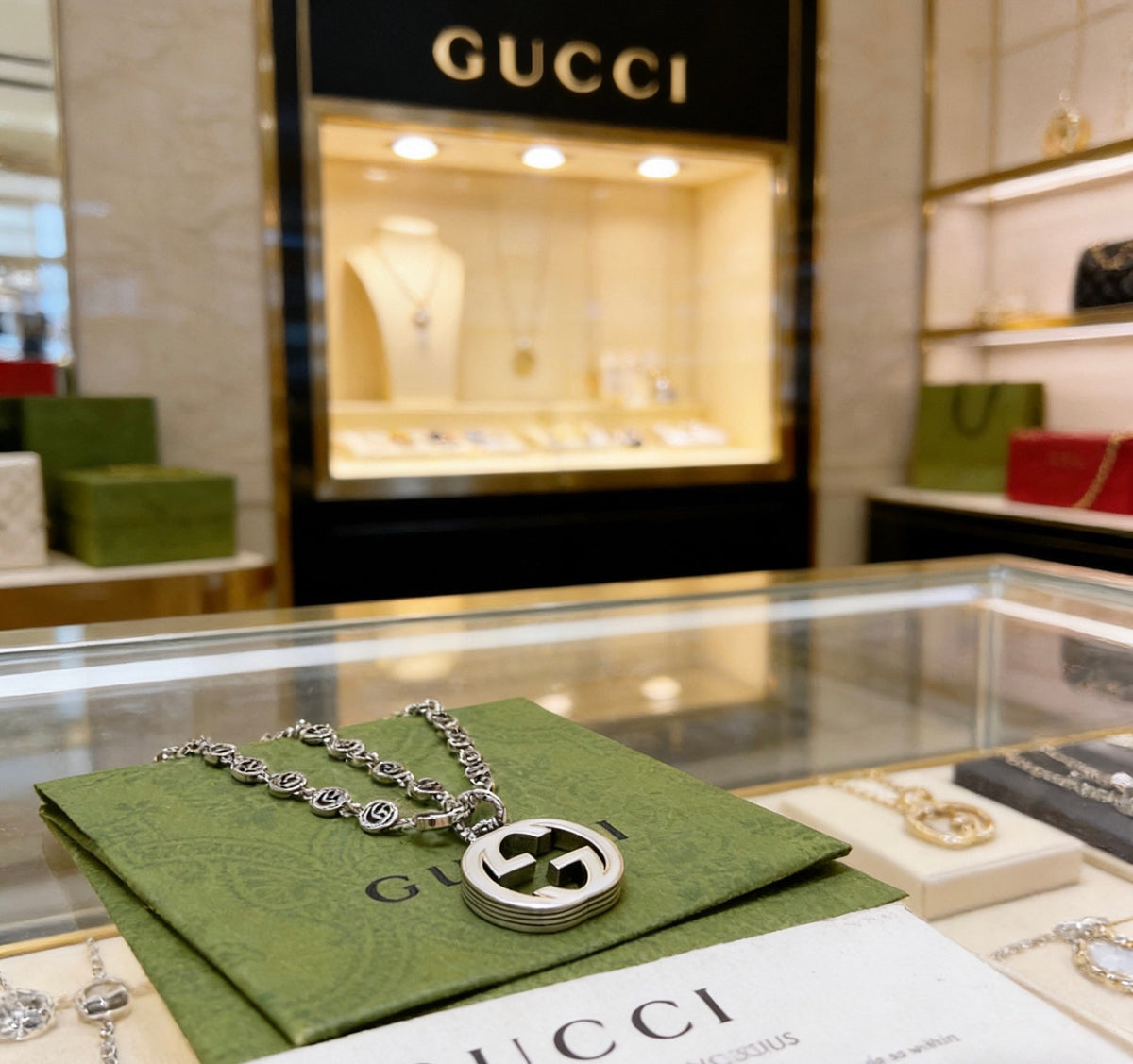 Double-G Emblem Pendant Necklace in Polished Metal-Tone – Design 011 detail view