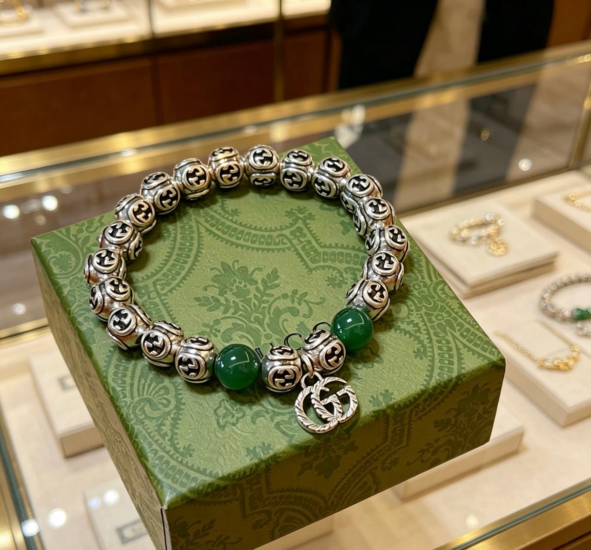 Double-G Emblem Beaded Bracelet in Polished Metal-Tone – Crystal Detail side detail