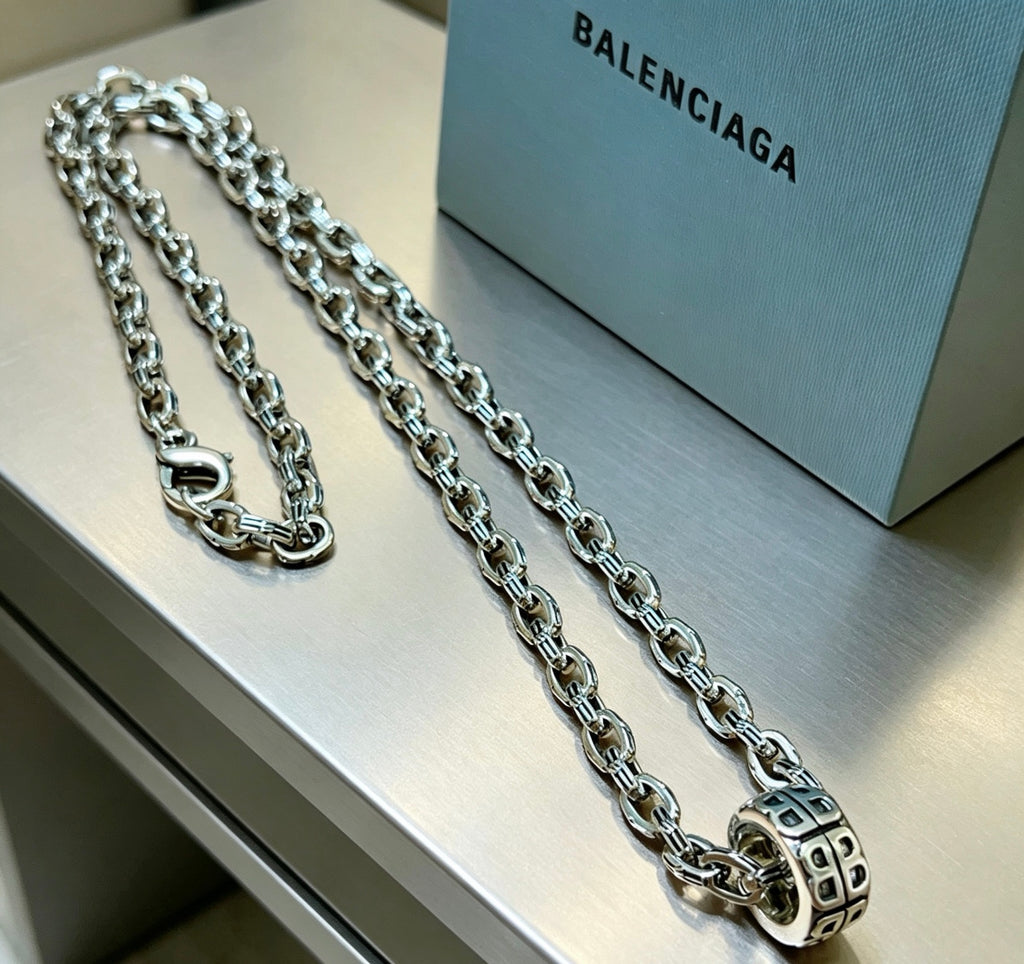 Geometric Emblem Pendant Necklace in Polished Metal-Tone – Vintage Detail front product view