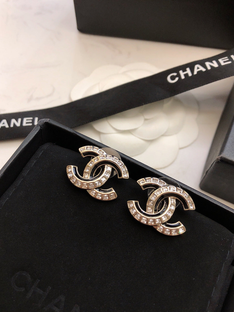 Double-C Emblem Crystal-Accent Stud Earrings – Black Detail front product view