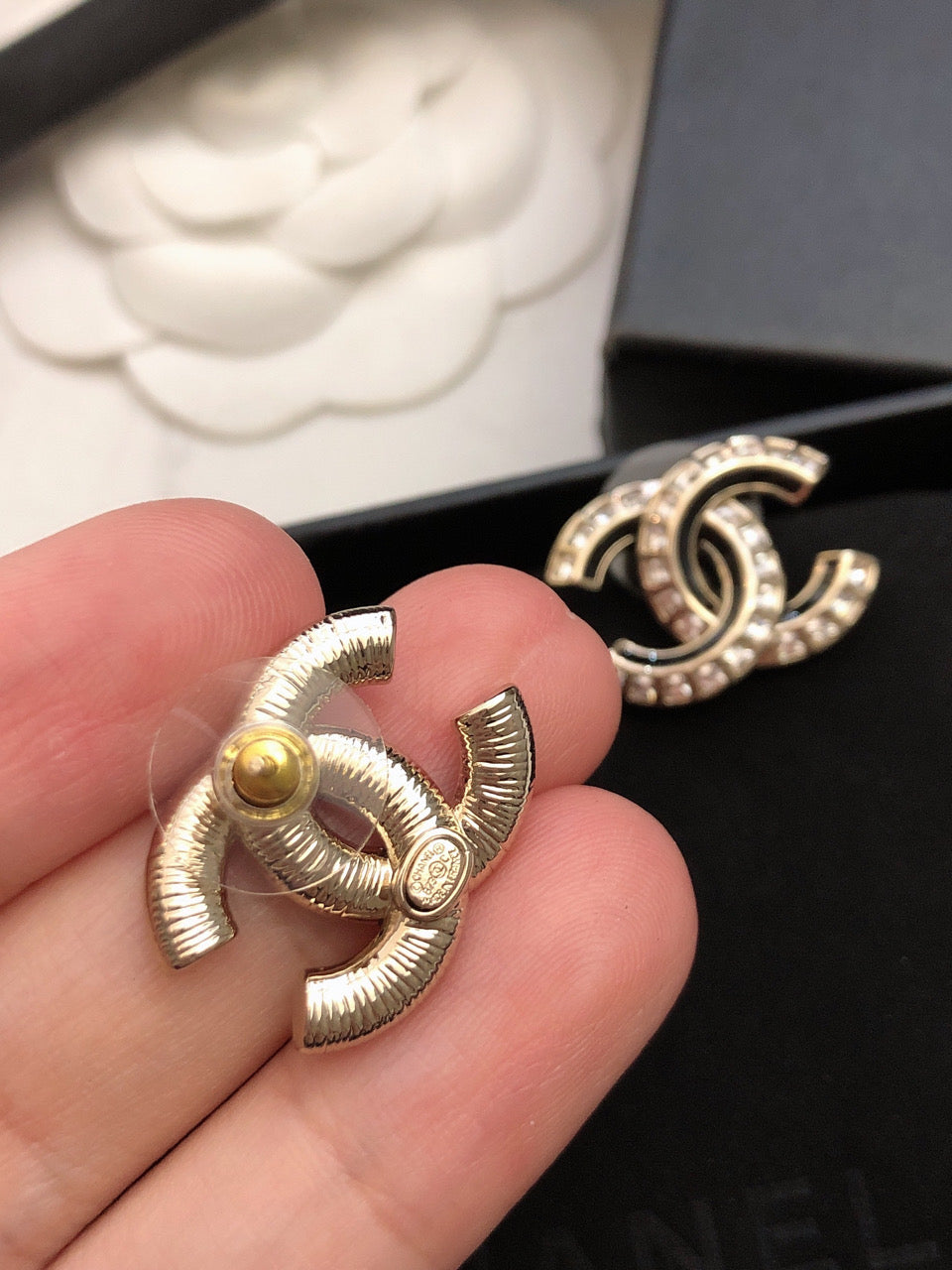Double-C Emblem Crystal-Accent Stud Earrings – Black Detail styled product view