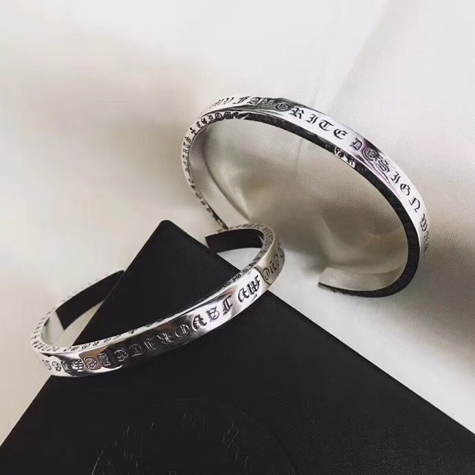 Signature Emblem Bangle in Polished Metal-Tone – Design 015 detail view